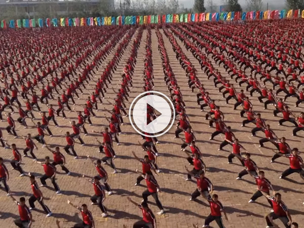 36,000 Kids from the Shaolin Temple Kung Fu Academy performing something amazing .