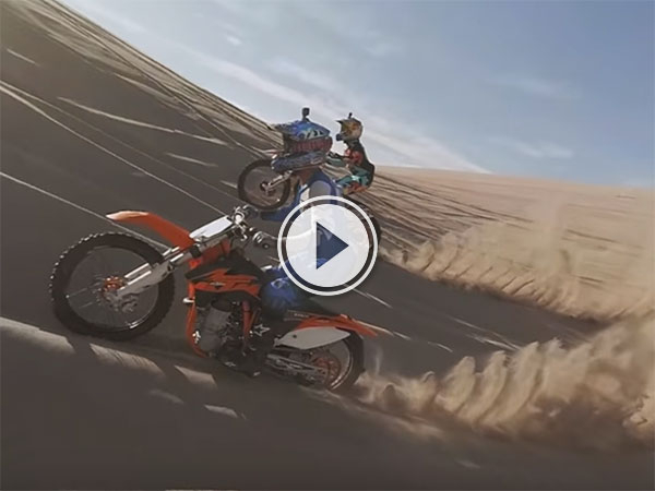 Dirt bike sand dune jumping (Video)