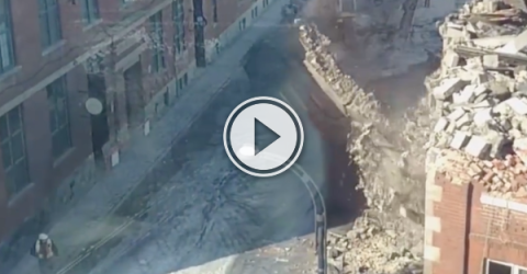 Dude narrowly avoids getting caught under a crumbling wall (Video)