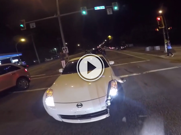 Helmet cam catches crazy car flip (Video)