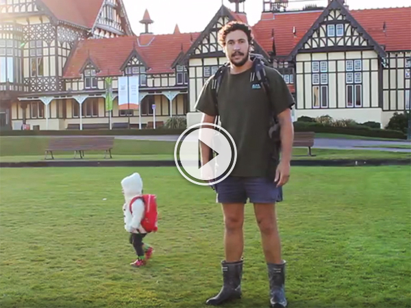 Screenshot image of a video of daddy standing with a little kid