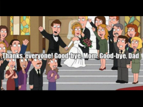 Groom waving goodbye to everyone after getting married!