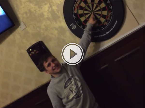 Man puts his fingers on the line in darts challenge (Video)
