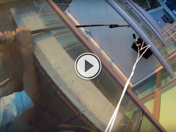 Of course a hockey stick is involved in a McGuyvered phone rescue (Video)