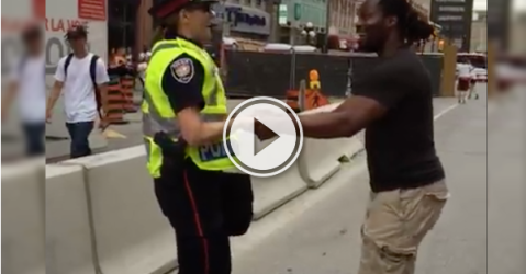 Ottawa officer and a pedestrian engage in a fun dance! (Video)