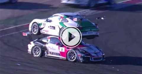Porsche Carrera rally crash ends with car on top of other (Video)