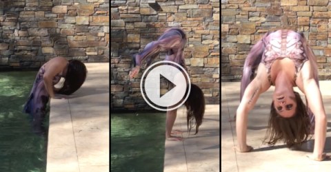 Girl climbs out of pool like she's in a horror movie (Video)
