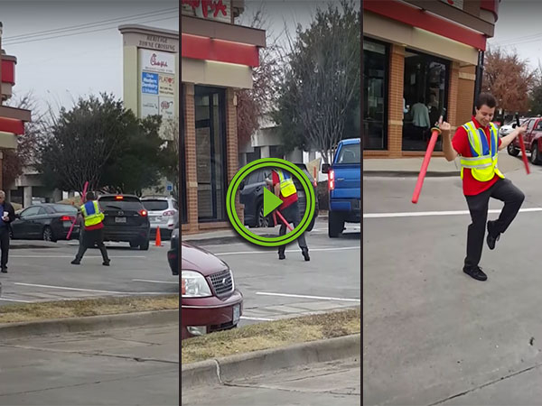 Parking attendant uses batons like lightsabers (Video)