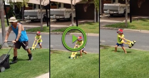 Little boy gets frustrated at his fake lawnmower (Video)