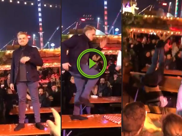 Guy dances on a table it doesn't end well (Video)