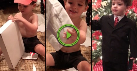 Adorable little boy gets a weatherman suit for christmas (Video)