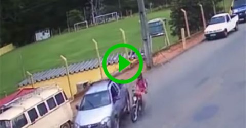 Motorcyclist has dramatic crash with car (Video)