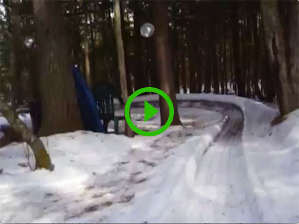 Guy builds epic ice slide in backyard (Video)