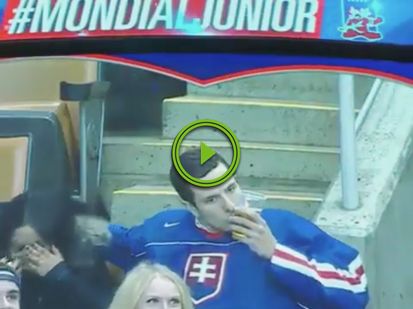 Hockey fan's got his priorities straight, that's for sure (Video)