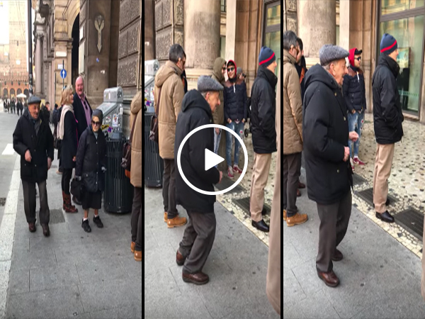 Elderly man dances in the streets of Italy