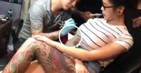 Cute Asian chick pulls a fake boob prank in tattoo parlor (Video)