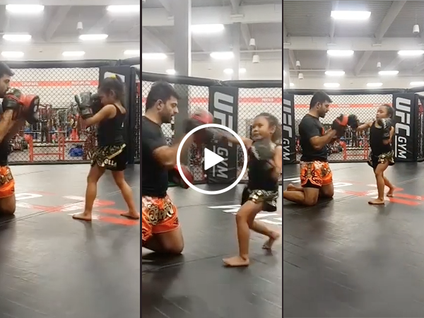 Little girl trades in babies for kick boxing and I'm not scared, you are!