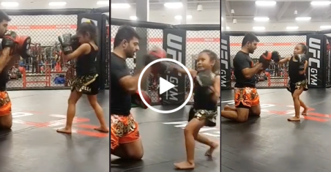 Little girl trades in babies for kick boxing and I'm not scared, you are!