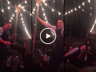 Drunk man attempts pole dance on table and fails miserably(Video)