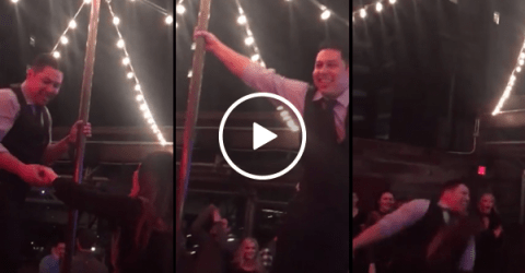 Drunk man attempts pole dance on table and fails miserably(Video)