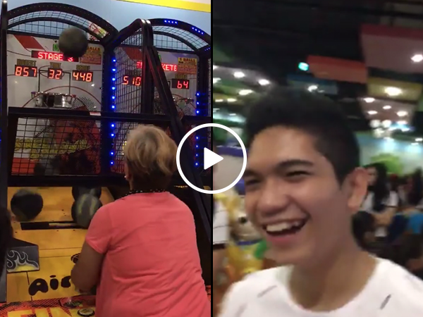 Mom destroys basketball arcade game in front of son (Video)