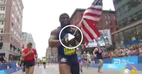 Amputee runs Boston Marathon with flag in hand