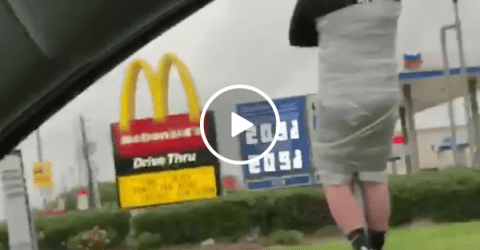 Guy loses bet and gets duck taped to pole (Video)