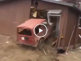 Man destroys house with his car (Video)
