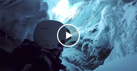 Incredible helmet cam footage of skier falling down hole (Video)