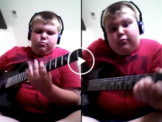 Little boy plays badass original riff on his guitar (Video)