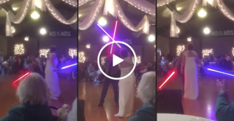 Couple has lightsaber fight for first dance