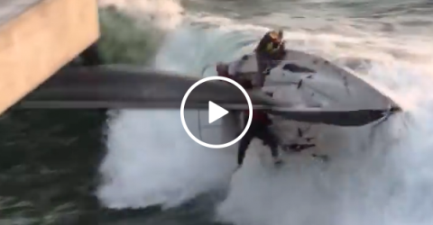 Terrifying moment sailboat capsizes into pier (Video)
