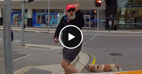 Angry pedestrian gets instant karma (Video)