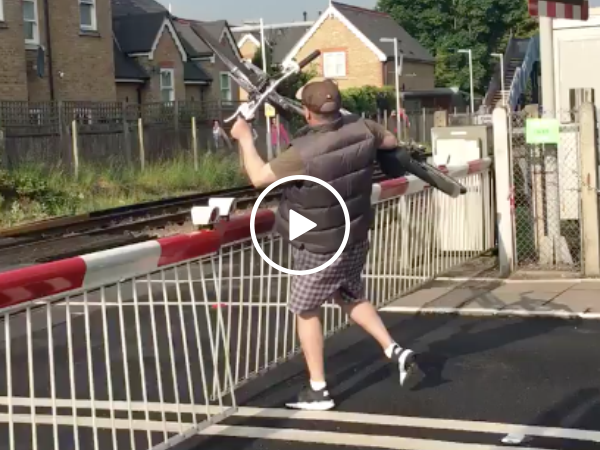 Drunk idiot almost gets hit by car (Video)