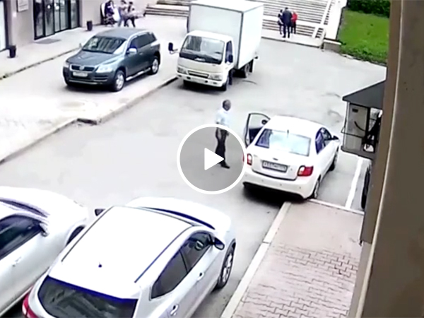 Woman crashes trying to park her car