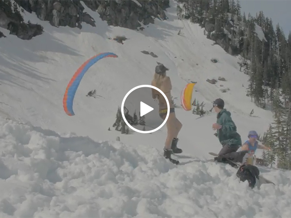 Parachuter almost hits skier
