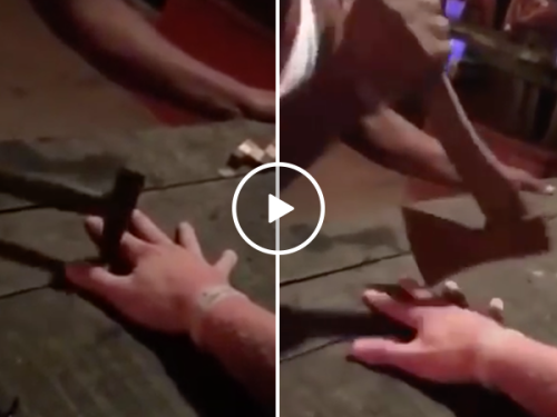 Man endures intense knife game for free shot at Thailand bar (Video)