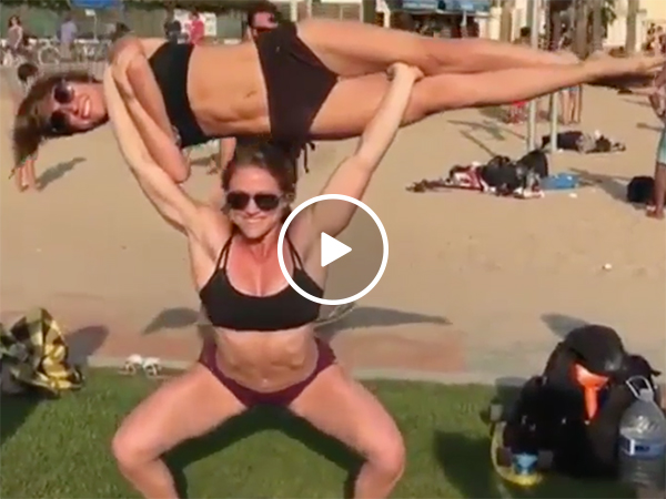 Ripped girl squats her friend (Video)