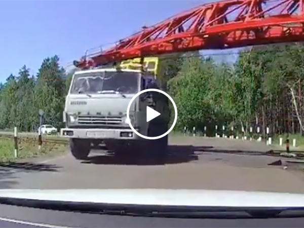 Truck driver crashes when trying to cross train tracks