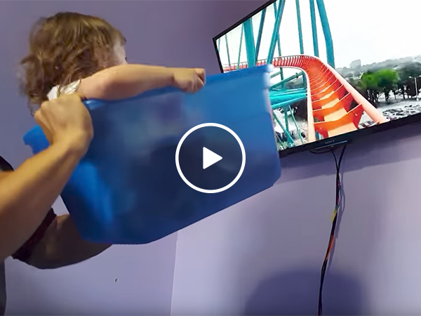 Dad takes his daughter for a roller coaster ride