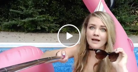 Girl falls into pool while taking a selfie