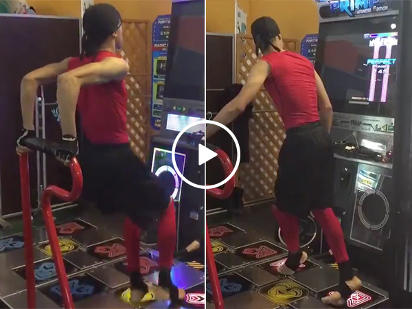 A guy gets really into dancing video game