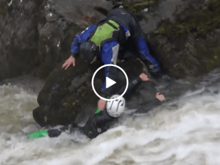 Kayaker saves friend in amazing river rapids rescue (Video)