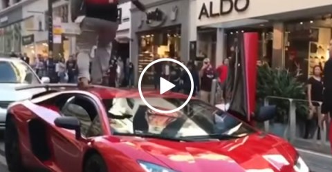 Douchebag runs down a Lamborghini, gets beautiful instant karma (Video)