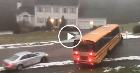 School Bus Can't Stop Sliding During Winter Storm