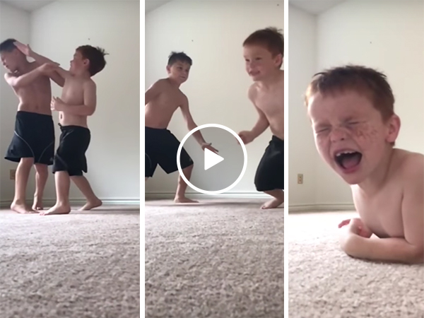Two young brothers have a fight in slow motion