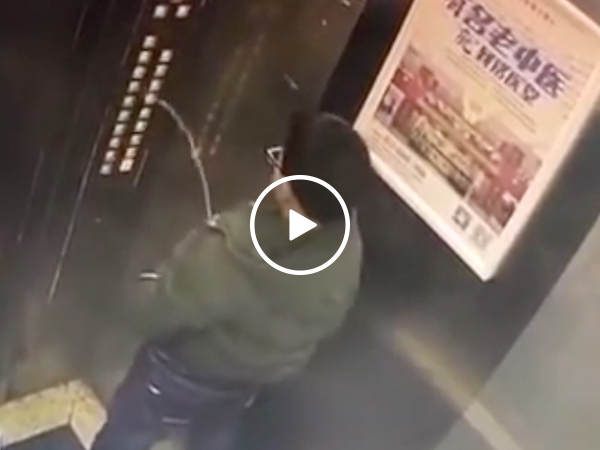 Idiot pees on elevator trapping himself inside (Video)