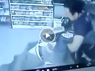 Robber gets spanked by shopkeeper (Video)