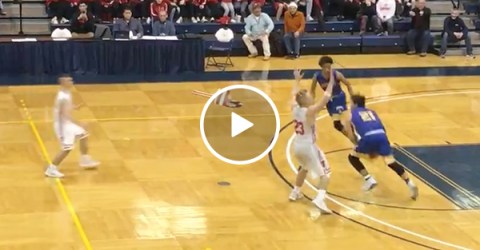 High School Basketball Player Makes A Full Court Shot To Win A Game