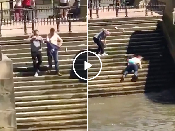 Guy Slips On Stairs And Falls All the Way Into The Water